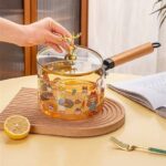 Olla de vidrio agarradera de madera